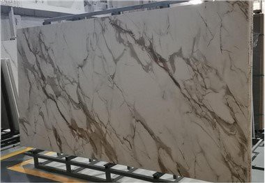 แผ่นพื้นพอร์ซเลนทอง Calacatta